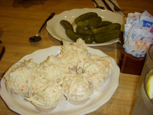 Creamy cole slaw and crunchy sour pickles