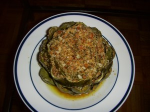 Artichoke presented with the reduced cooking liquid
