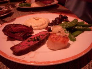 A little taste of everything - seared diver scallop, flat iron steak, skirt steak, potato puree, roasted shiitake mushrooms, sugar snap peas