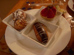Cream puffs, eclair, strawberry tart