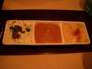 Feta and olive spread, roasted red pepper dip, and hummus