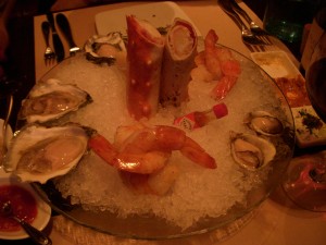 Assorted oysters, prawns, and Alaskan king crab legs