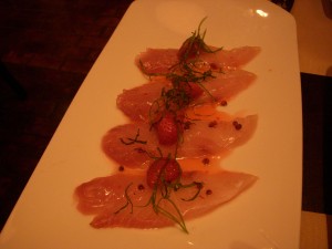 Yellowtail crudo with pickled strawberries and mint