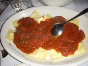 Cheese ravioli with meat sauce