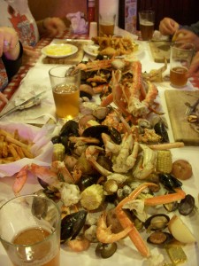 Crazy amount of seafood dumped in the middle of the table