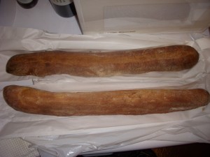 Whole wheat baguette from Amy's Bread on top, regular baguette from Sullivan St. on the bottom