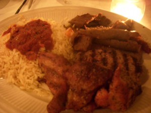 Combination platter with gyro, bifteki, and pork souvlaki