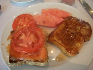 Smoked salmon and tomato on whole wheat toast, watermelon, french toast