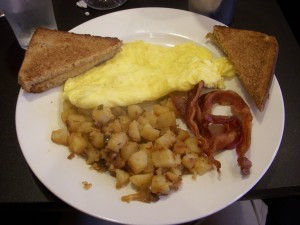 Bacon, home fries, scrambled eggs, whole wheat toast
