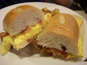 Standard bacon, egg, and cheese on a roll and homefries