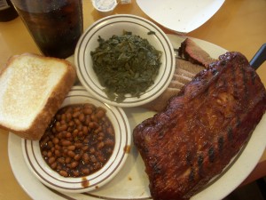 Beef brisket, baby back ribs, baked beans, Texas toast, collard greens