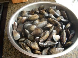 Huge bowl of mussels ready to be cooked