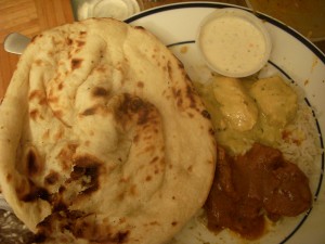 A little taste of everything with a big fluffy piece of naan