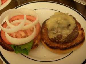 Thick, juicy burgers on brioche with lettuce, tomato, and onions