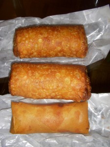 Egg rolls and a spring roll on the bottom