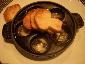 Garlicky snails with brioche toast