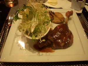 Duck confit with fingerling potatoes and frisee