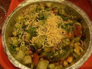 Disappointing alu chaat with bland, almost raw potatoes