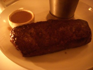 Perfectly cooked steak with a nicely formed outer crust, but disappointing au poivre sauce on the side