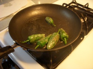 Frying up the peppers in some oil
