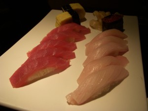 Tuna, yellowtail, tamago, and ikura sushi