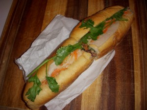Pork banh mi with pate, pickled vegetables, and cilantro