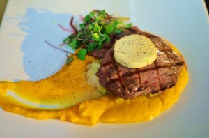 Venison skirt steak with pureed sweet potatoes and melted leeks