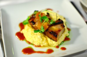 Crispy glazed pork belly with smoky barbecue and roasted South Carolina peaches