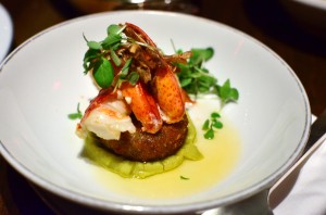 Butter poached lobster with crispy pork and split pea emulsion
