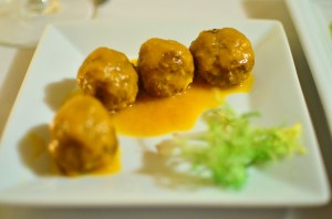 Moroccan lamb meatballs with spicy tomato glaze