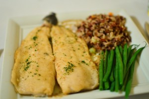 Trout ala meuniere with lemon parsley brown butter wild rice medley and green beans