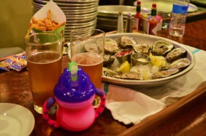 Happy hour at Luke - 50 cent oysters, half priced beer, and milk in a sippy cup
