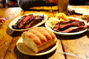 Table of food (and you can see J's little hand reaching out to snag a rib!)