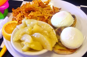 Crab cakes benedict with homes fries and hot cinnamon apples