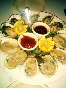 Kumamoto (west coast) oysters on top, blue points (east coast) on the bottom