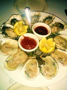 Kumamoto (west coast) oysters on top, blue points (east coast) on the bottom